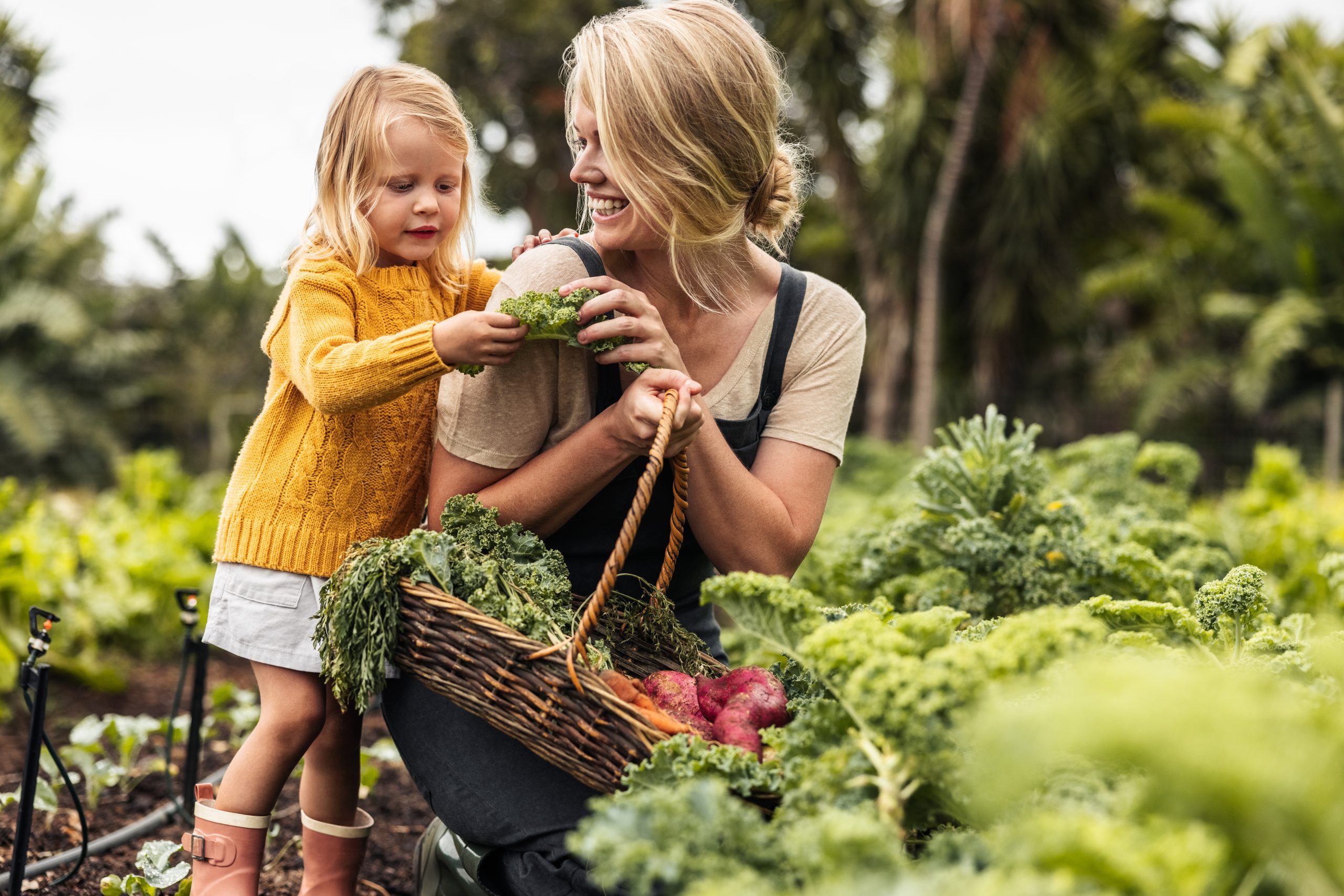 Mother and Daughter with Fresh Vegetables